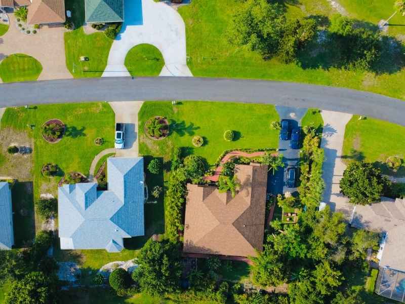 Aerial view of residential properties with road and driveway access for a plat of survey in Knoxville Tennessee